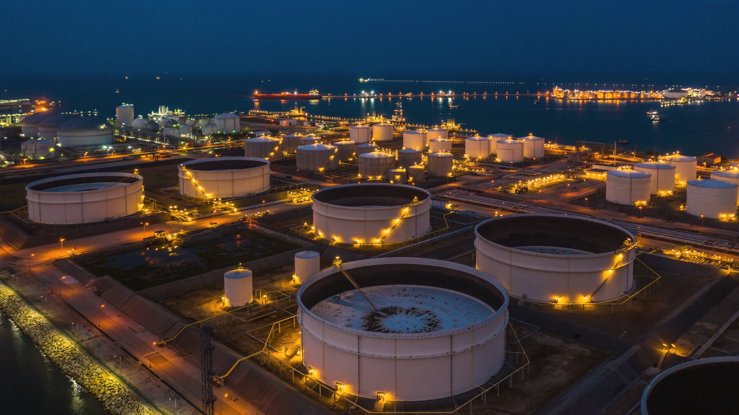 Petroleum storage terminal at night